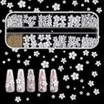 Comparatif des Meilleurs Produits pour un Nail Art Élégant : La Fleur Blanche à l'Honneur Comparatif des Meilleurs Produits pour un Nail Art Élégant : La Fleur Blanche à l'Honneur